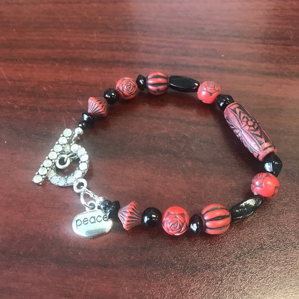 Glass and wood bead bracelet.